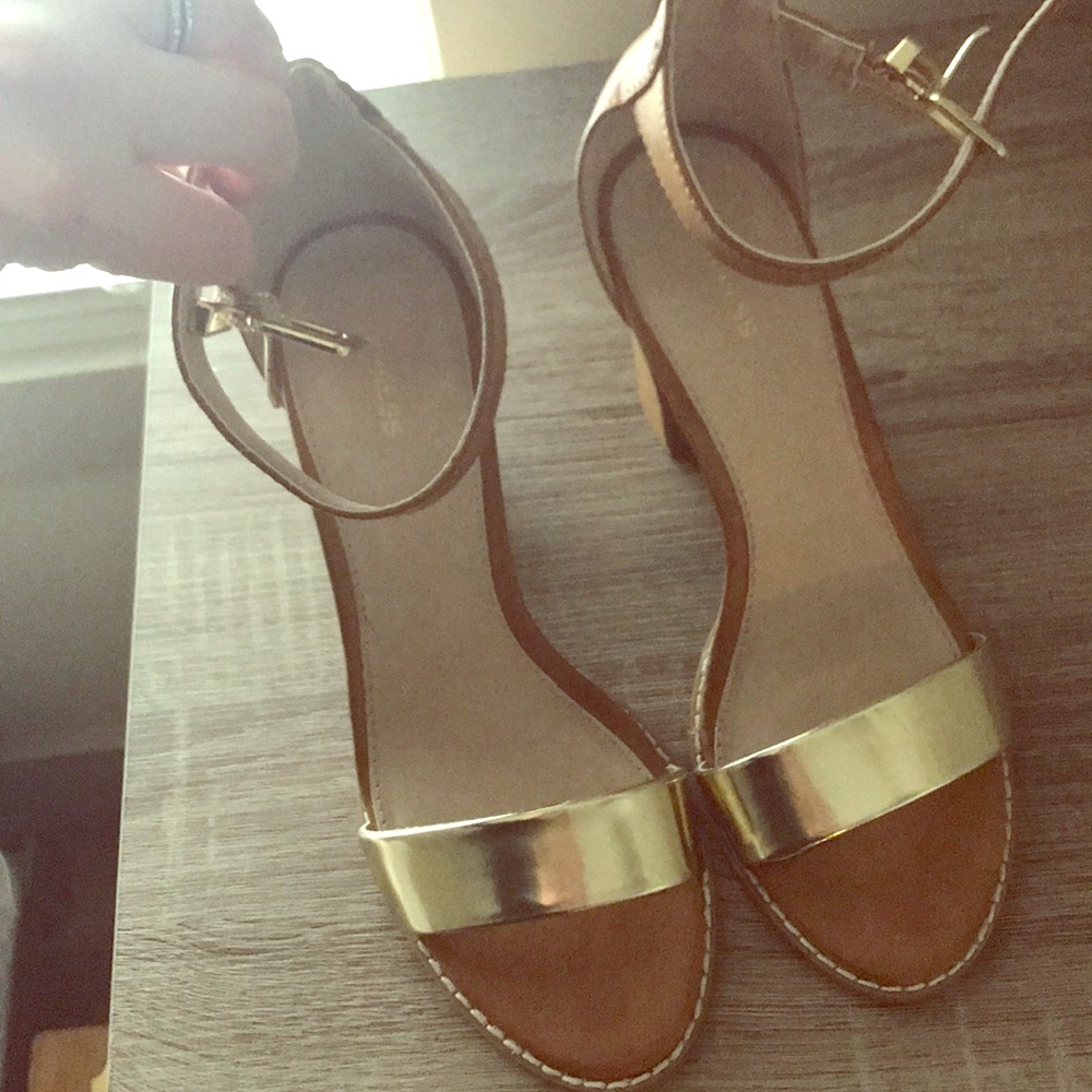 Gold and tan express heels